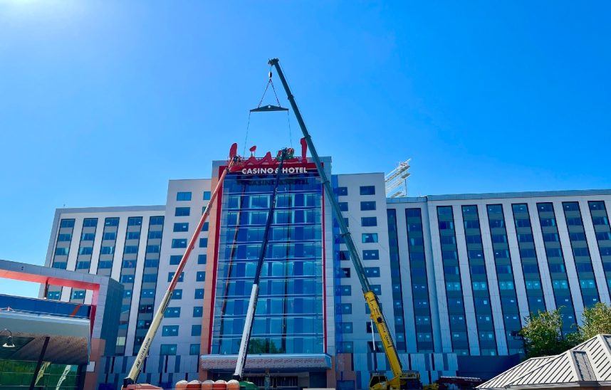 Construction workers lift the Live! sign above the forthcoming Live! Casino & Hotel Louisiana